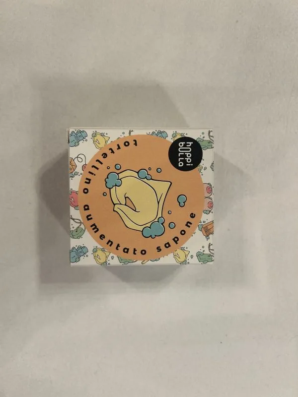 Solid tortellini-shaped soap (yellow) with pink pepper scent - Image 2